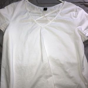 White shirt with straps in front shirt from SHEIN. Size Medium